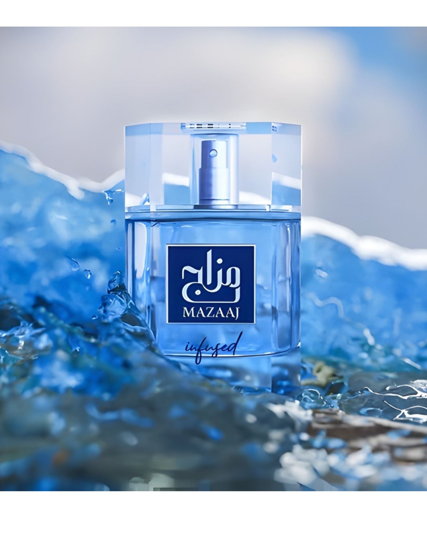 A promotional photo of the Mazaaj Infused Edp light blue perfume bottle, featuring a clear hexagonal cap and a blue and white label, set amidst rushing, crystalline blue water or ice, suggesting a fresh, aquatic scent.