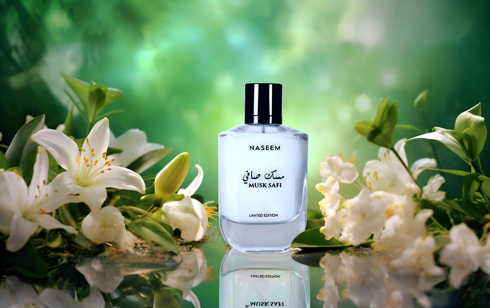 Naseem Musk Safi alcohol-free perfume bottle situated beside lily-of-the-valley flowers.