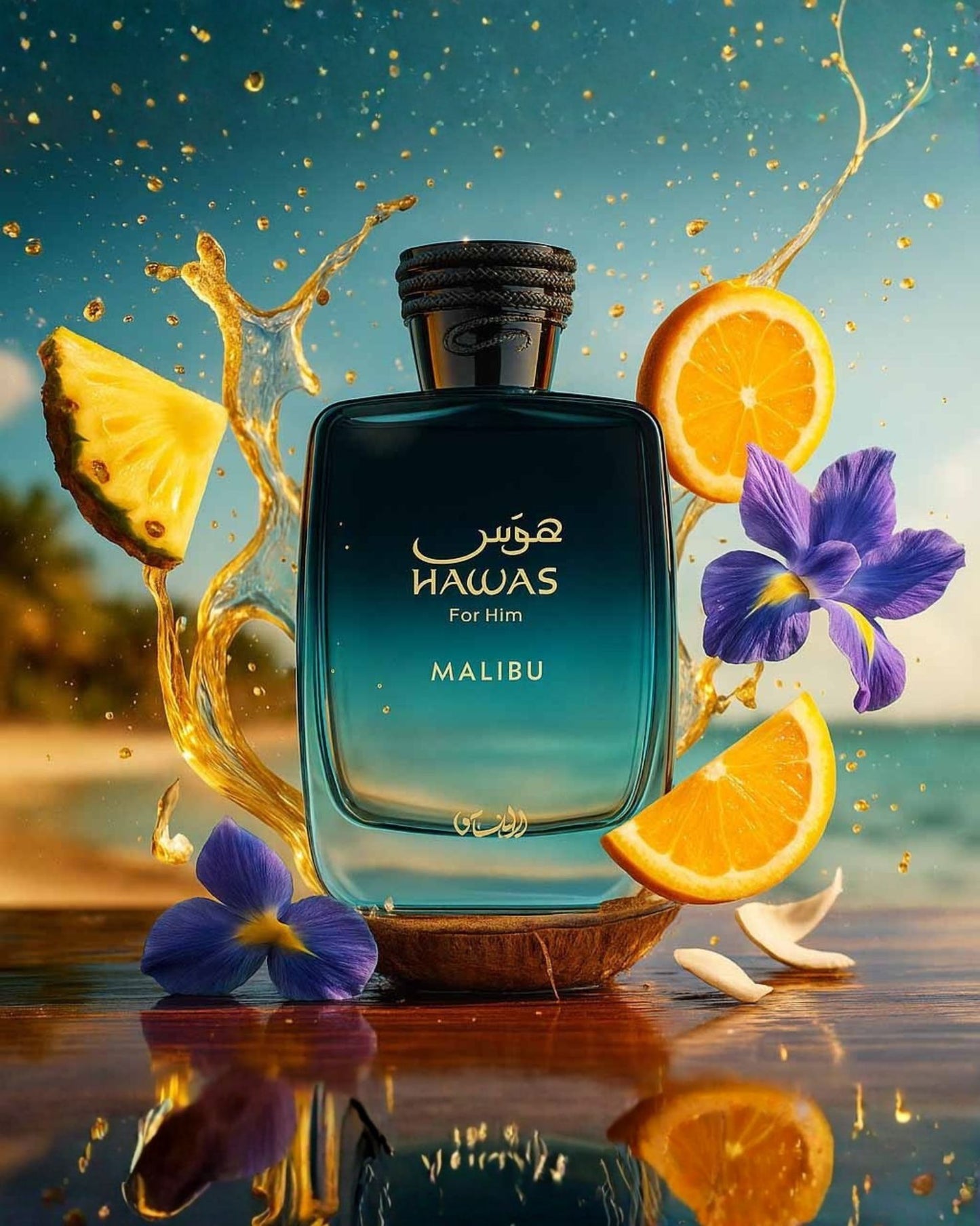 A vibrant product shot of the Hawas For Him Malibu EDP fragrance bottle. The black-to-blue gradient bottle is surrounded by splashes of gold liquid, slices of orange, a piece of pineapple, and purple iris flowers, set against a blurred beach background.