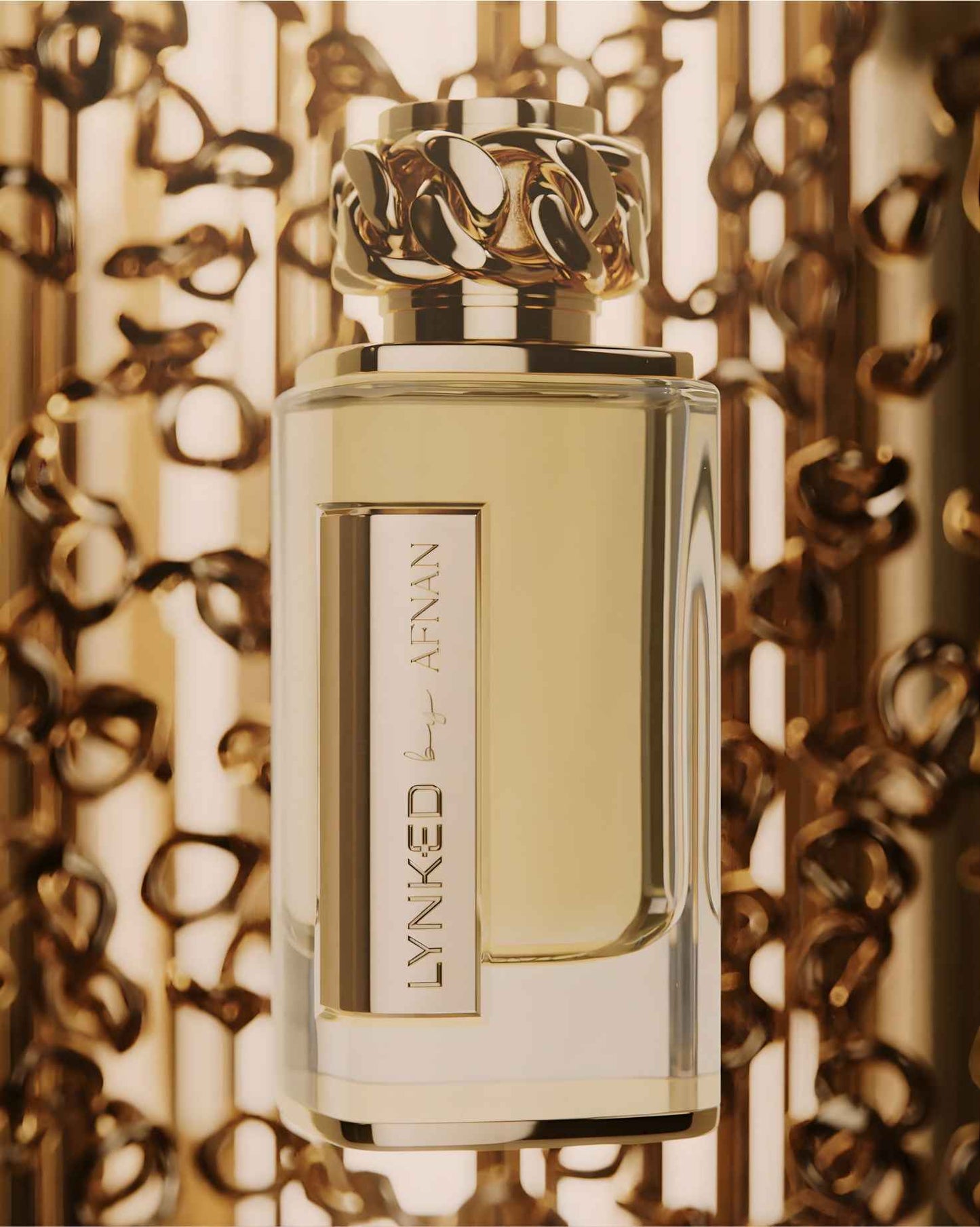 A close-up artistic shot of Afnan Lynked forever edp perfume featuring the signature gold chain-link cap, set against a warm, blurred background of golden light and bokeh patterns for a luxury aesthetic.