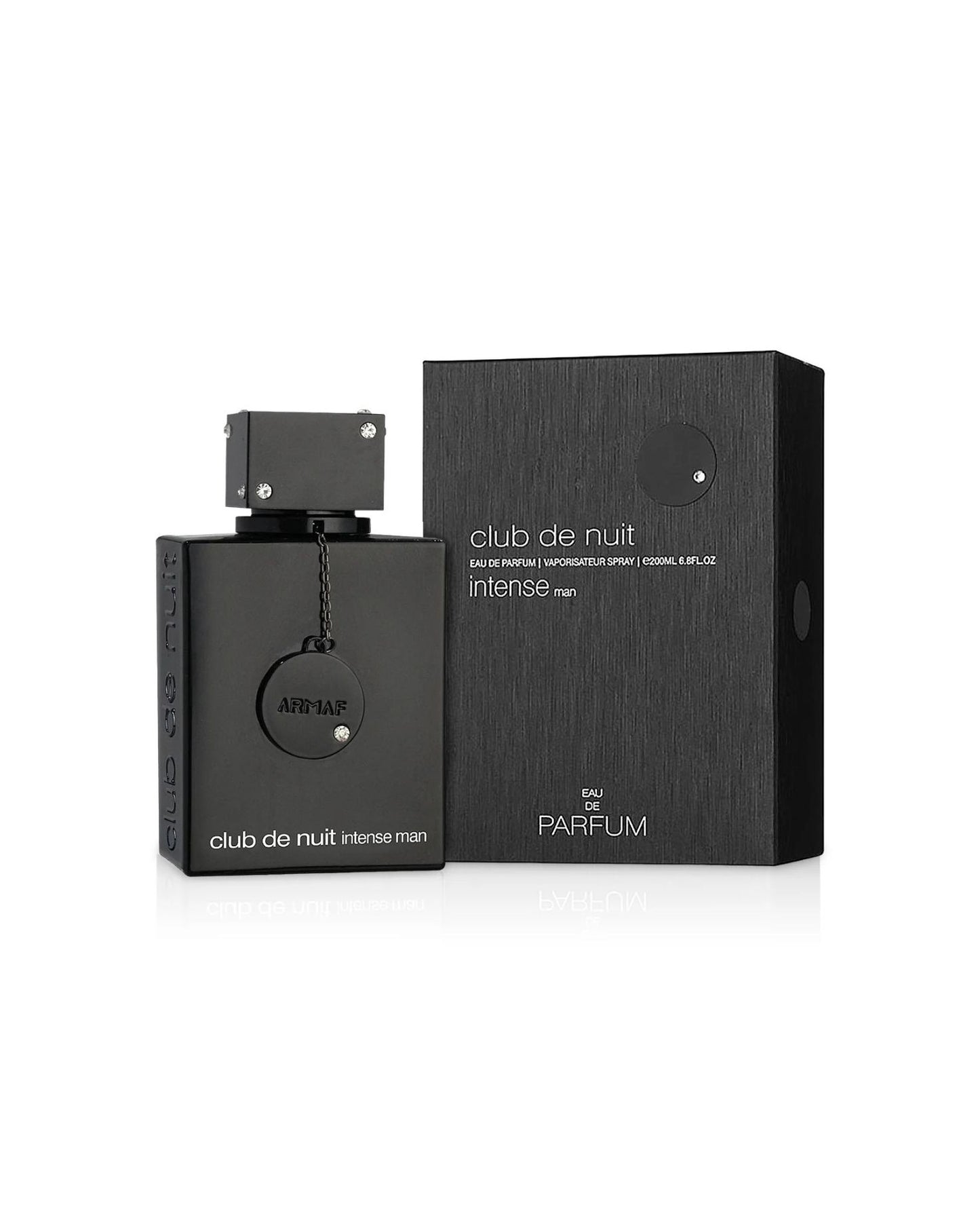The Armaf Club de Nuit Intense Man Eau de Parfum set, featuring the black bottle with a jewel-studded cap and chain-tag next to its matching black box with a textured, carbon-fiber-like design.