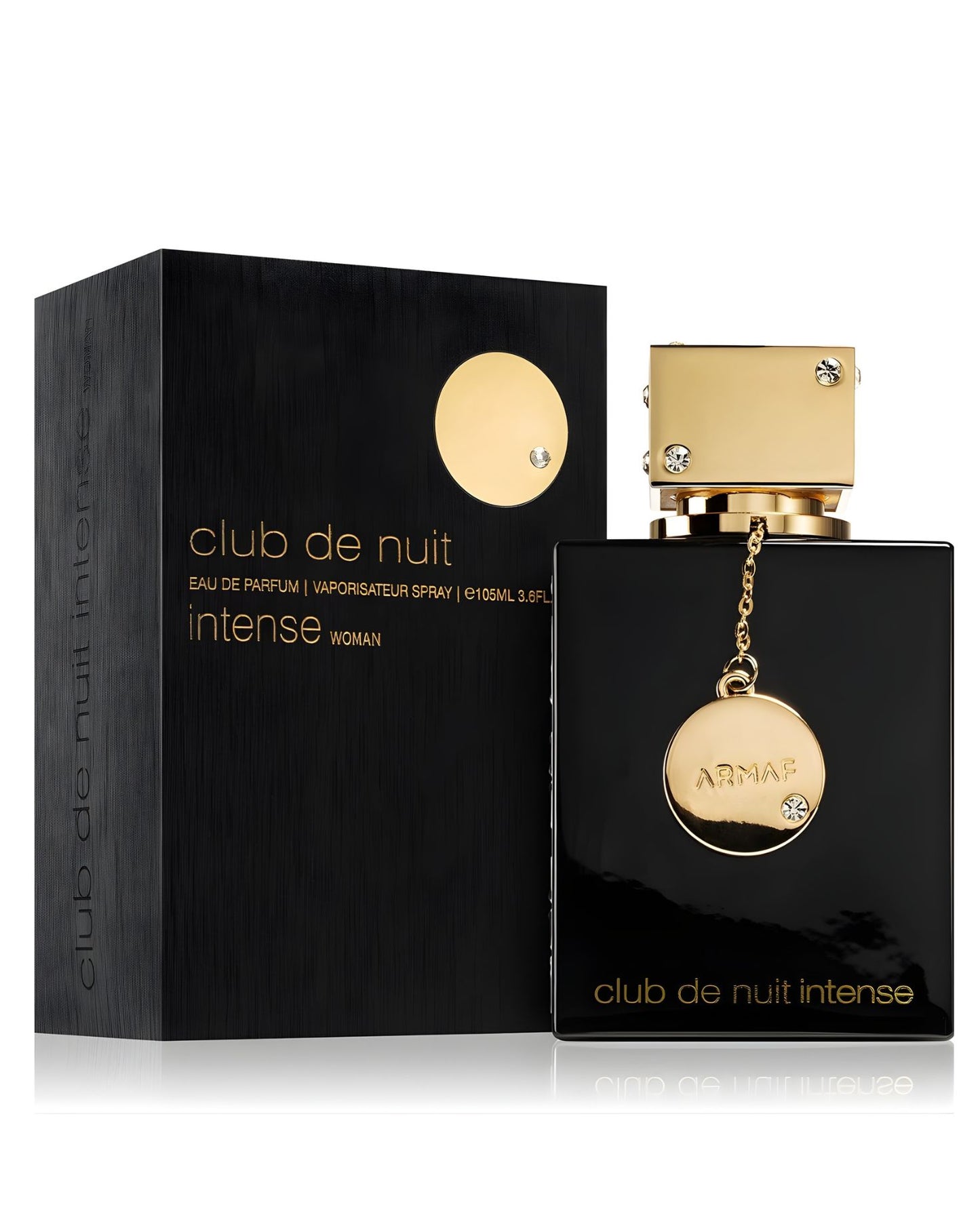 The Armaf Club de Nuit Intense Woman Eau de Parfum set, featuring a glossy black bottle with a gold cap and charm next to its textured black box, which has gold text and a circular gold accent.