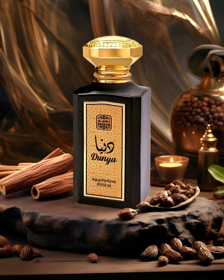 dunya-aqua-parfum-showcasing-surrounded-by-its-ingredients-like-tonka-sandalwood-cardamom.