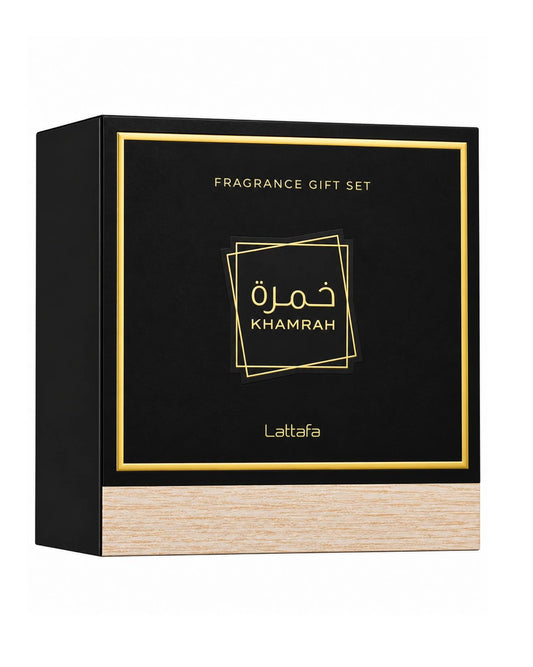 Closed black and gold Lattafa Khamrah fragrance gift set packaging box with wood grain base accents.