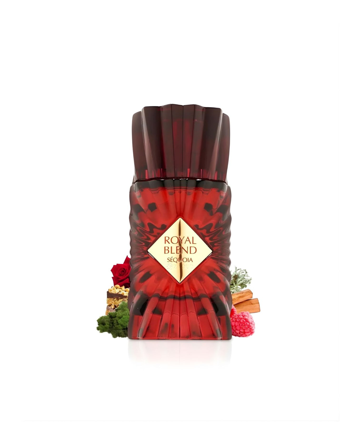 A deeply ribbed, marbled red perfume bottle labeled "Royal Blend Sequoia," sitting on a bed of green moss and surrounded by a red rose, cinnamon sticks, a raspberry, and what appears to be a small slice of cake, against a white background.