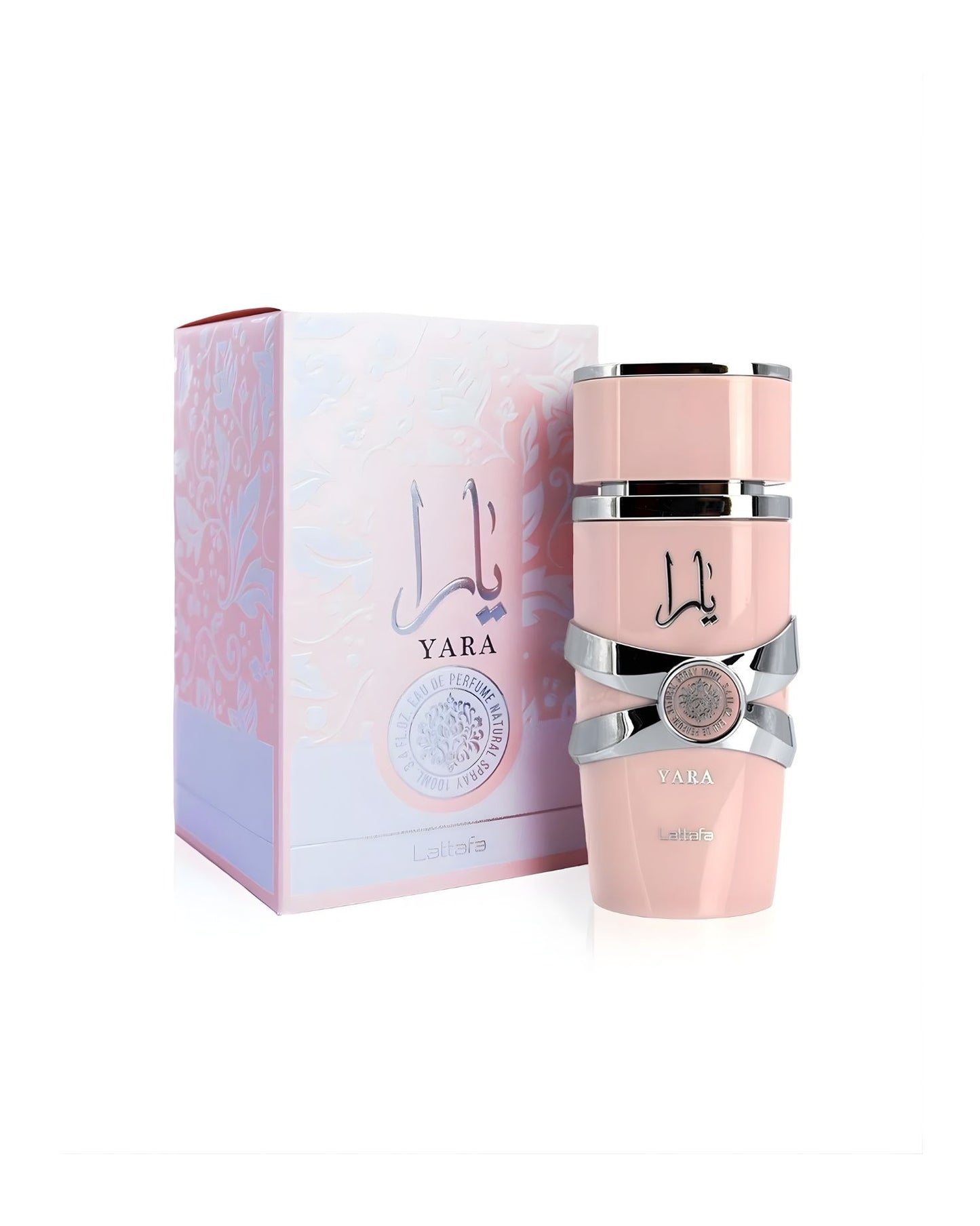 The Lattafa Yara Eau de Parfum set, showing the pink cylindrical bottle with a silver belt accent next to its matching pink and white box, which features a floral embossed design.