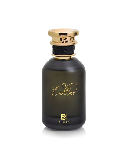 A dark, rounded perfume bottle from AHMED, labeled with the word "Endless" in gold script. The bottle has a gold-colored cap with a black band detail around the neck, set against a white background.
