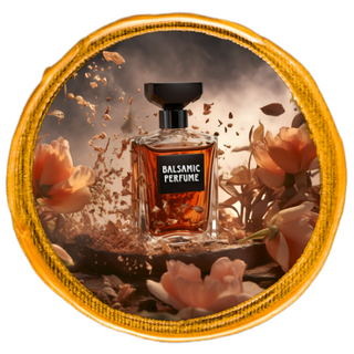 A balsamic-scented perfume bottle encircled by blossoms, set against a dark backdrop.