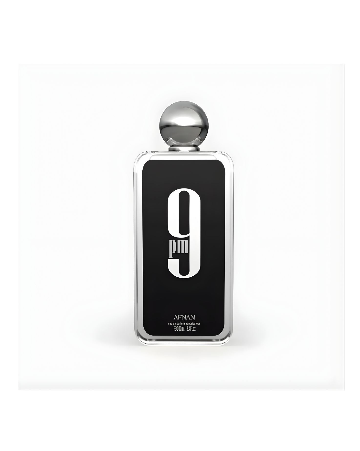 A rectangular glass bottle of Afnan 9 PM Eau de Parfum, 100ml / 3.4 fl.oz., featuring a black label with a large white "9 PM" graphic and a silver spherical cap, set against a white background.