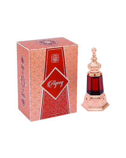 Aqeeq perfume bottle and accompanying box displayed against a white background.