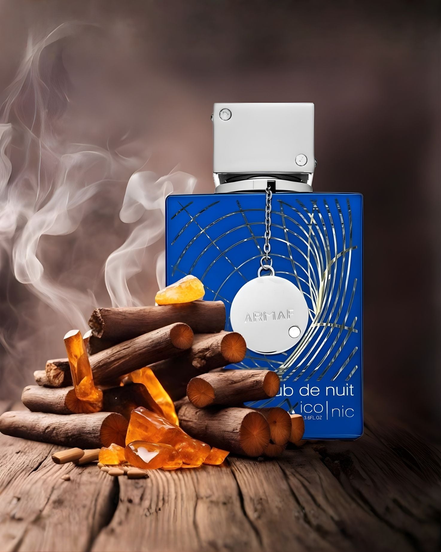 Armaf Club de Nuit Iconic blue Edp perfume bottle placed on a rustic wooden surface, surrounded by stacked wood pieces and orange amber resin, with smoke rising on the left.