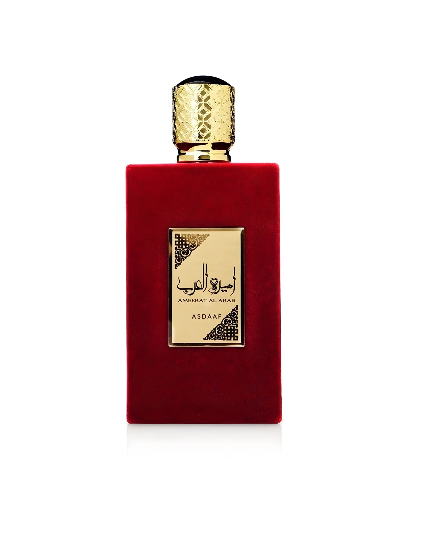 A rectangular red velvet perfume bottle with a gold label featuring Arabic script Ameerat Al Arab Edp and the brand name ASDAAF. The cap is gold with an intricate embossed pattern.