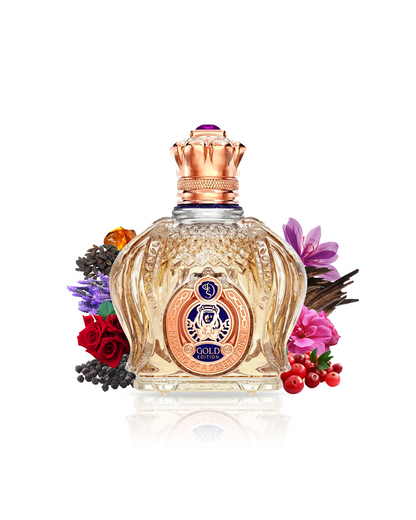 Designer Shaik Opulent Shaik Gold Edition perfume bottle encircled by saffron, lavender, oud, sandalwood, and tonka bean.