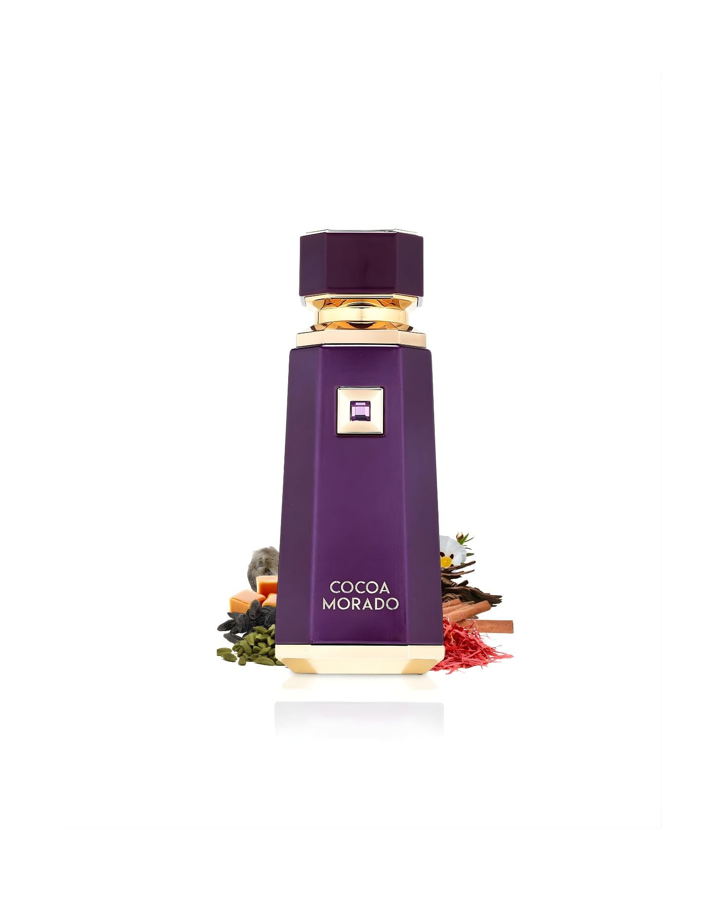The deep purple, geometric Cocoa Morado perfume bottle with gold accents, set amidst various scent ingredients, including green seeds, cinnamon sticks, saffron threads, and small white floral accents, against a white background
