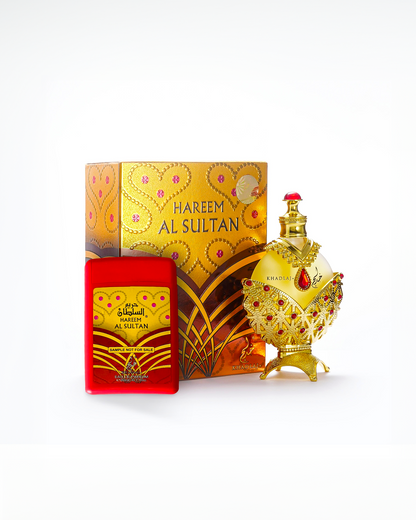 Hareem Al Sultan Gold perfume bottle along with its box set and 20ml sample pack against a white background