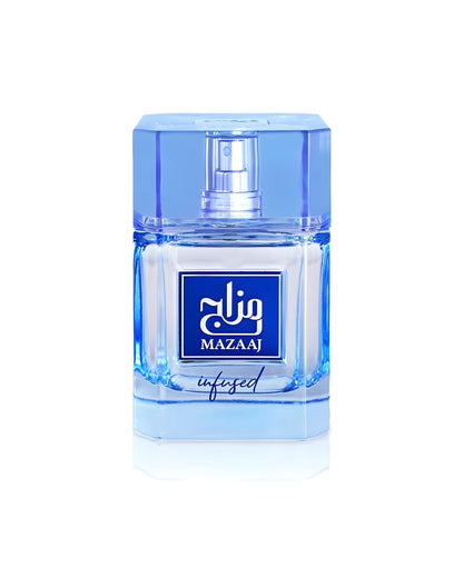 A clear glass perfume bottle with a light blue tint and a hexagonal blue cap. The label is white and blue, featuring the name Zimaya Mazaaj Infused Edp in both English and Arabic script, with the word 'infused' written in cursive below it.