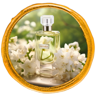 Perfume bottle placed on a marble desk, with white flowers accenting the background.