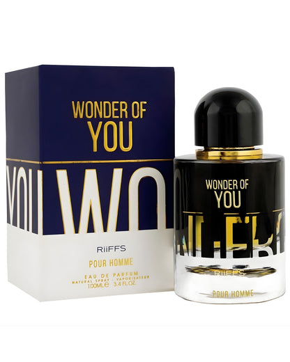 RIIFFS Wonder of You Pour Homme EDP bottle next to its packaging box. The box is dark blue and white, with 'WONDER OF YOU' in gold letters and 'POUR HOMME' on the white section. The cylindrical bottle has a black and clear glass design with gold accents, and features 'WONDER OF YOU' and 'POUR HOMME' on the label. The volume is 100ml or 3.4 Fl.Oz.