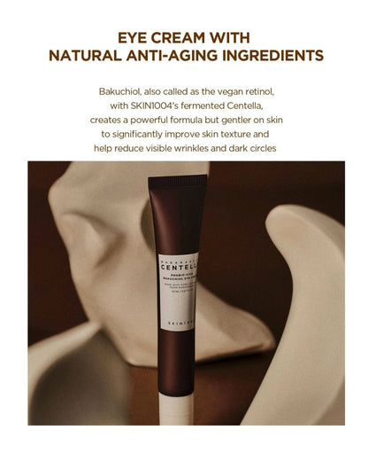 SKIN1004 Madagascar Centella Probio-Cica Bakuchiol Eye Cream in a vertical dark brown tube with a white base and cap, presented on a pure white background.