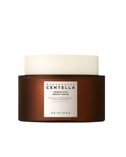 SKIN1004 Madagascar Centella Probio-Cica Enrich Cream in a dark brown jar with a white lid.