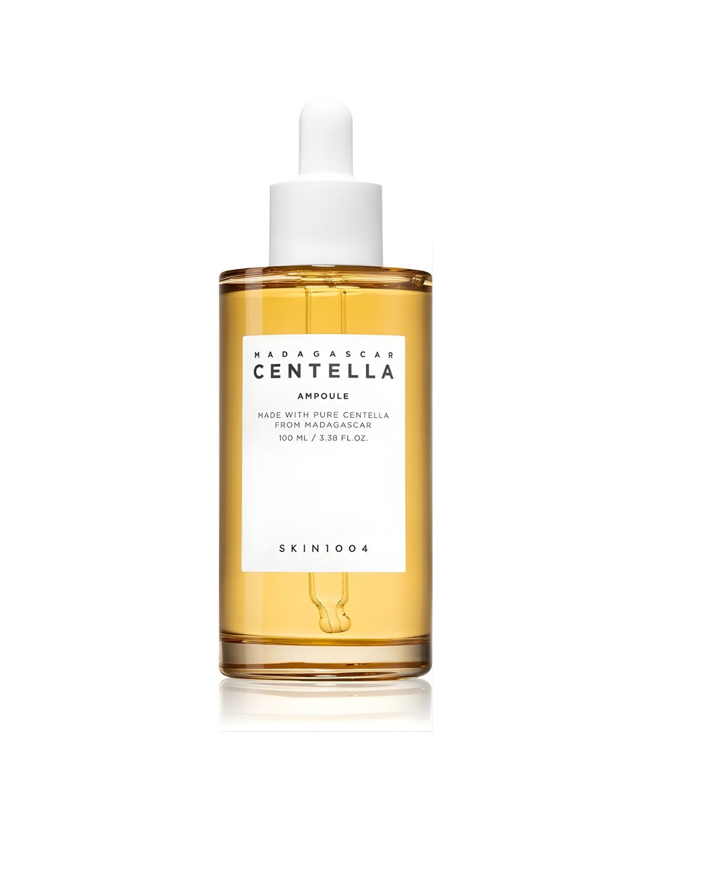 SKIN1004 Madagascar Centella Ampoule (100 mL size) in a clear glass dropper bottle. The light amber liquid is visible, and the white label identifies the product as containing pure Centella from Madagascar.