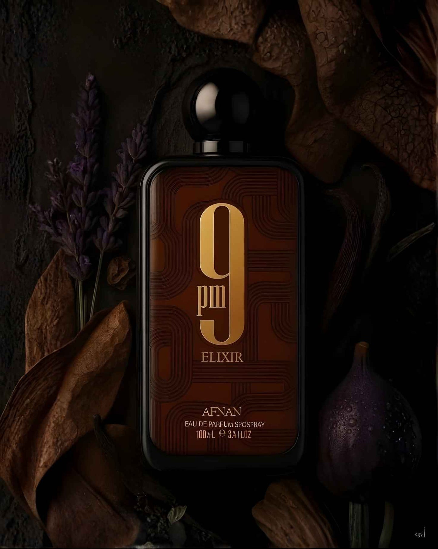 Afnan 9PM ELIXIR EDP perfume bottle surrounded by aesthetic fragrance notes including lavender sprigs, dark wood, and a fresh fig on a textured background.