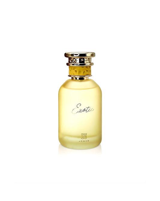 Frosted yellow glass perfume bottle labeled "Exotic" with a gold cap, produced by Ahmed.