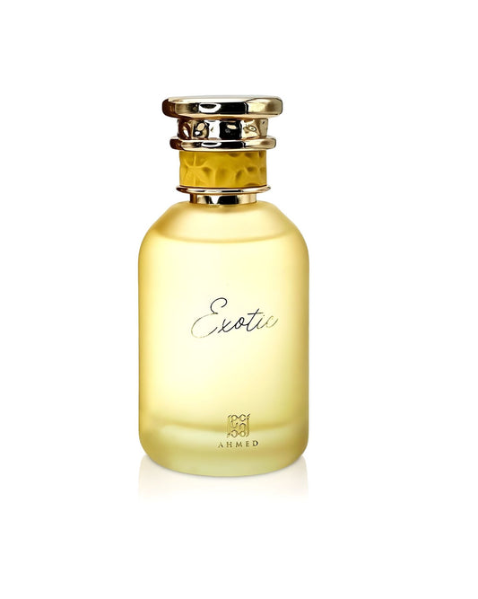 Frosted yellow glass perfume bottle labeled "Exotic" with a gold cap, produced by Ahmed.
