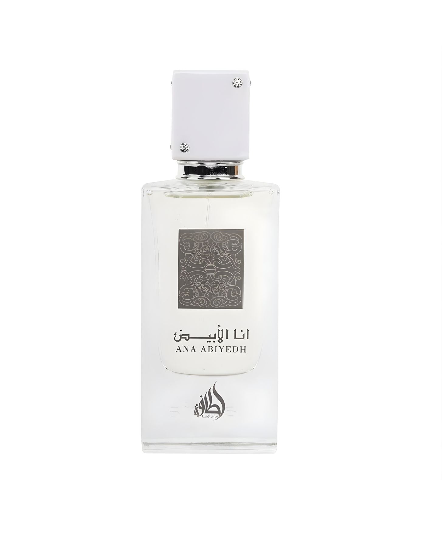 A clear, rectangular perfume bottle containing colorless liquid, labeled with dark gray Arabic calligraphy and the text 'ANA ABIYYEDH'. The bottle has a square white cap accented with four small clear jewels, isolated against a bright white background.
