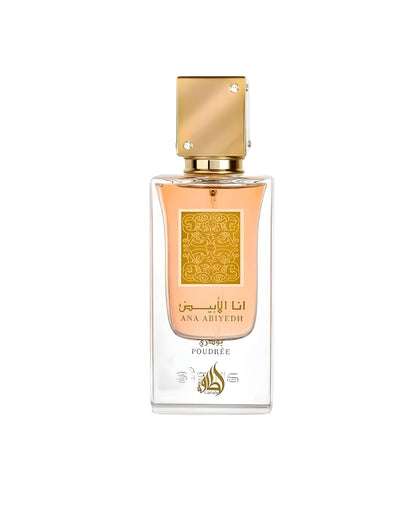The rectangular 'Ana Abiyedh Poudree' perfume bottle, containing light pink liquid and topped with a shiny gold cap, stands on a white marble surface. The label features ornate gold design and text. Strong, diagonal shadows from window light fall across the bottle and background.
