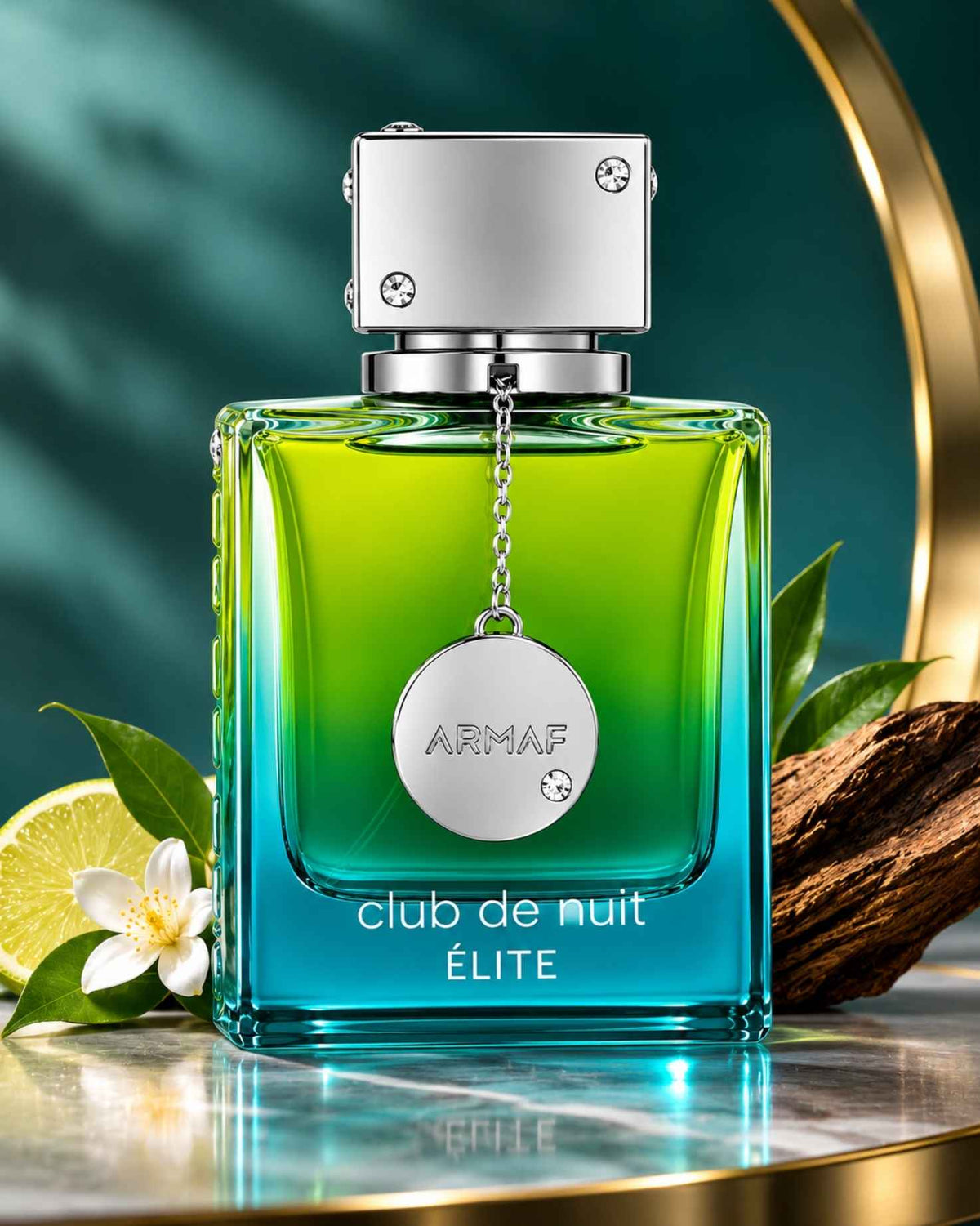 Armaf Club de Nuit Élite Eau de Parfum bottle surrounded by citrus lime, white jasmine flower, and natural wood log elements on a reflective surface.