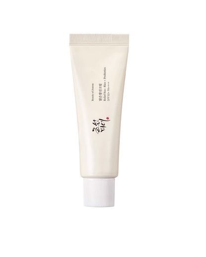 A white, squeeze-tube of Beauty of Joseon Relief Sun: Rice + Probiotics SPF 50+ PA++++ sunscreen, shown vertically against a pure white background.