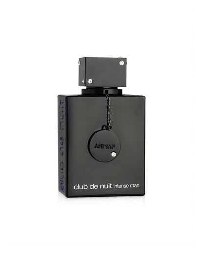 A sleek, rectangular, all-black Armaf Club de Nuit Intense Man perfume bottle, featuring a decorative round tag, and a square cap adorned with small clear jewel accents, isolated against a white background.
