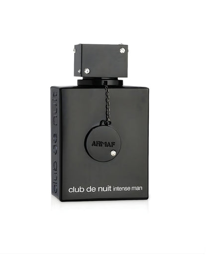 A sleek, rectangular, all-black Armaf Club de Nuit Intense Man perfume bottle, featuring a decorative round tag, and a square cap adorned with small clear jewel accents, isolated against a white background.