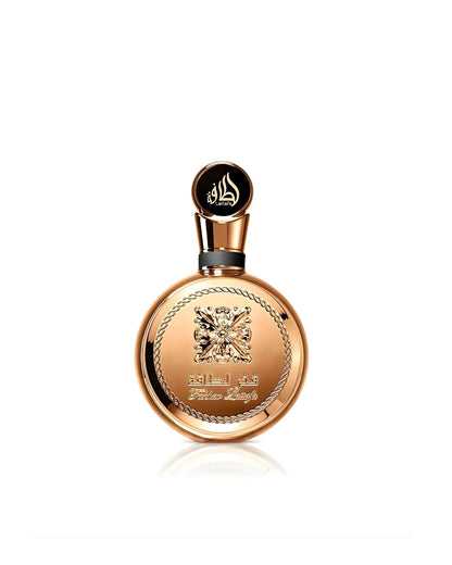 A stunning, circular Lattafa "Fakhar Lattafa" perfume bottle, featuring an entirely gold or copper-toned body with a large ornate central emblem and a decorative rope-chain border, isolated against a white background.