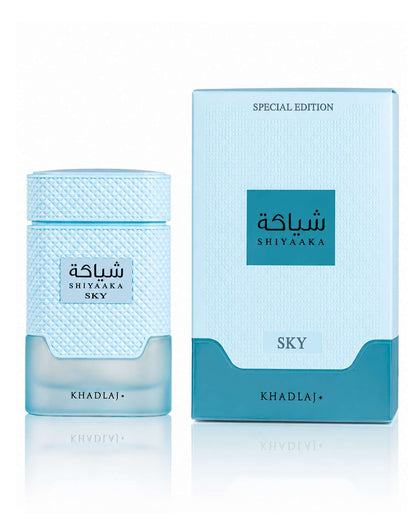 Khadlaj Shiyaaka Sky Special Edition perfume bottle next to its light blue product box