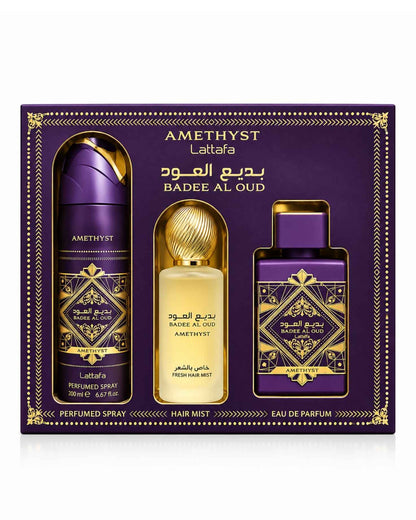 Lattafa Bade'e Al Oud Amethyst 3-piece luxury fragrance gift set box containing a 200ml perfumed body spray, a fresh hair mist, and an Eau de Parfum bottle in deep purple and gold packaging.