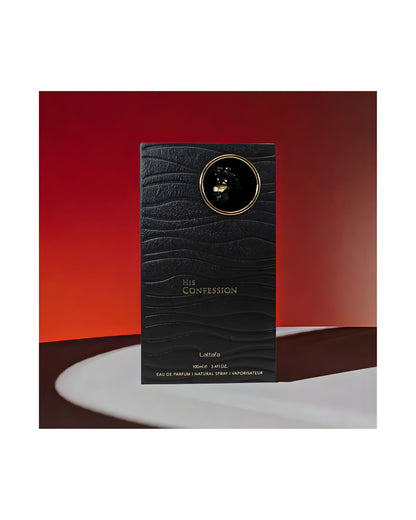 Lattafa His Confession Eau De Parfum black textured box, showing the gold and black cap detail, sitting on a white surface with a dramatic red and black background. 100ml