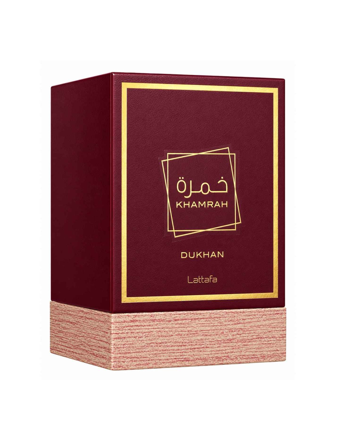 Closed burgundy and gold Lattafa Khamrah Dukhan Eau de Parfum packaging box with textured wood grain base against a plain white background.