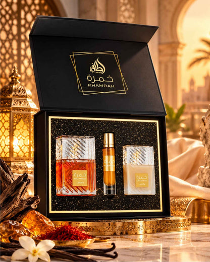 Open Lattafa Khamrah fragrance gift set box displayed on a golden stand with amber resins, saffron threads, vanilla beans, and a glowing Arabic lantern.