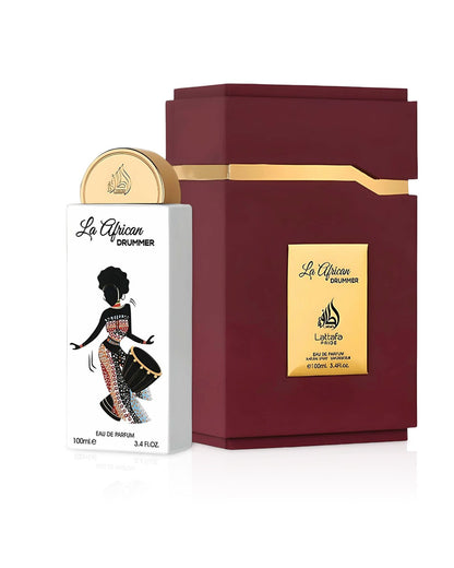 Lattafa Pride La African Drummer Eau De Parfum 100ml bottle standing next to its luxury maroon and gold presentation box. The white bottle features a silhouette of an African woman playing a drum