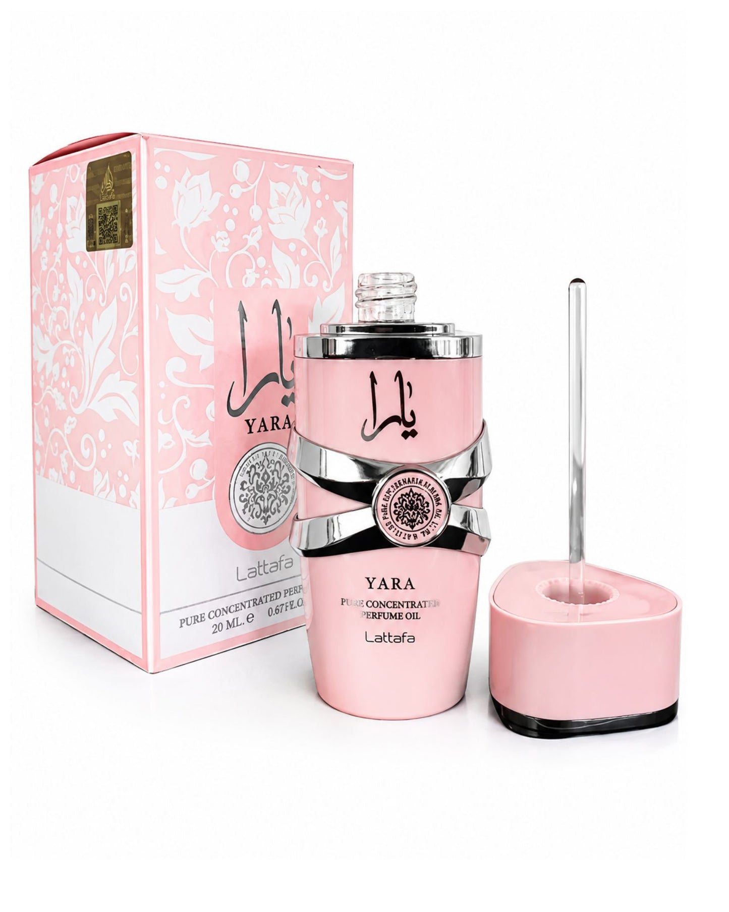 Lattafa Yara Pure Concentrated Perfume Oil 20ml bottle shown unboxed next to its pink floral packaging and glass applicator cap.