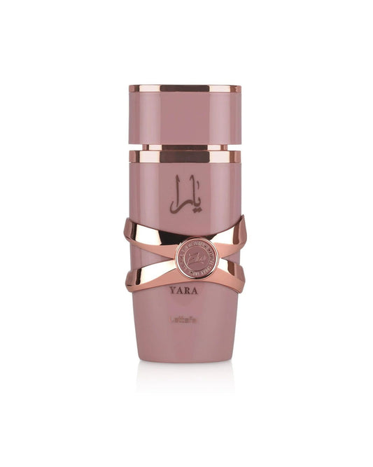 Lattafa Yara Elixer Edp perfume bottle. It is a matte dusty-rose pink with rose-gold metallic accents and a decorative criss-cross band around the middle.