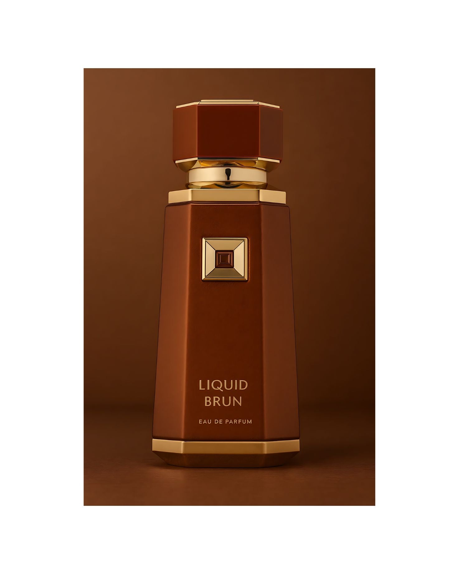 A tall, brown perfume bottle with 'Liquid Brun Eau de Parfum' text and a gold octagonal cap. The bottle features a central gold plaque with a dark amber jewel.