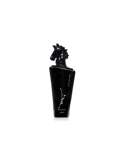 A close-up product shot of the black Lattafa "Maahir Black Edition" perfume bottle, featuring a sculptural, all-black horse's head as the cap, isolated against a white background.