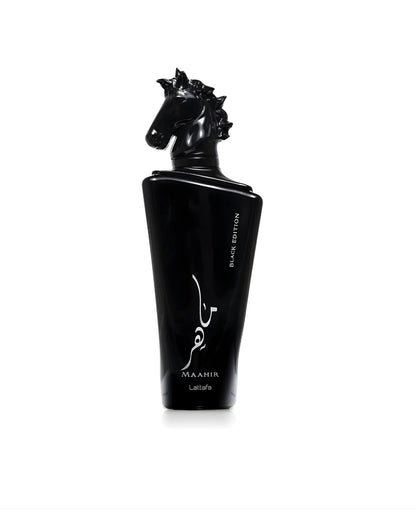 A close-up product shot of the black Lattafa "Maahir Black Edition" perfume bottle, featuring a sculptural, all-black horse's head as the cap, isolated against a white background.