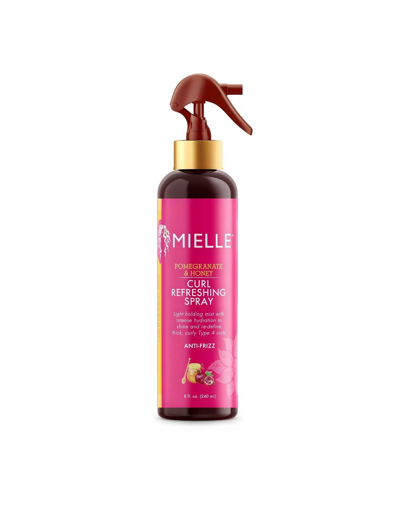 A bottle of Mielle Pomegranate & Honey Curl Refreshing Spray. The dark brown bottle has a gold neck and a brown trigger sprayer. The pink label states "POMEGRANATE & HONEY CURL REFRESHING SPRAY" and describes it as a "light holding mist with intense hydration to reactivate and redefine thick, curly Type 4 curls" and is "ANTI-FRIZZ.