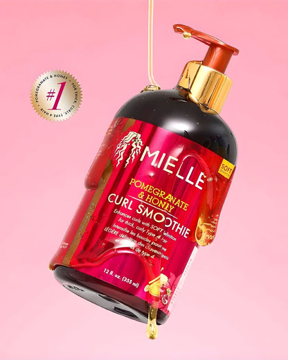 A bottle of Mielle Pomegranate & Honey Curl Smoothie tilted dramatically against a pink background, covered in dripping honey. A circular badge in the upper left corner features a number one symbol and reads "#1 FOR THICK, CURLY, TYPE 4 HAIR.