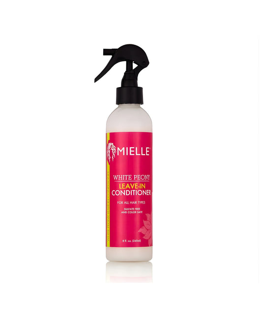 A white spray bottle of Mielle White Peony Leave-In Conditioner for all hair types. The bottle has a black spray trigger and a pink label stating it is sulfate free and color safe.