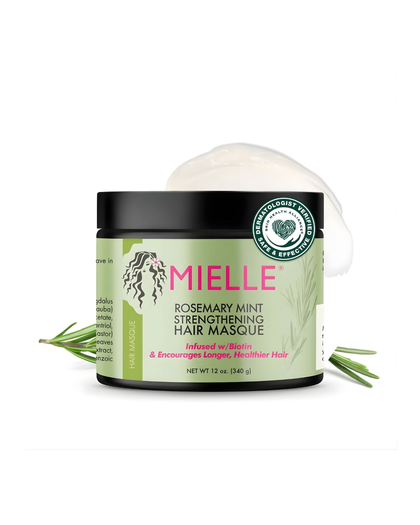 The Mielle Rosemary Mint Strengthening Hair Masque jar, featuring a black lid and a green label with rosemary illustrations. A dollop of white masque product is visible on top, and sprigs of fresh rosemary frame the jar. The label indicates it is 'Infused w/ Biotin & Encourages Longer, Healthier Hair' and is 'DERMATOLOGIST VERIFIED,' isolated against a white background.